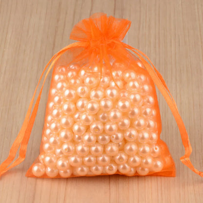 100 peças 24 cores bolsa de embalagem de joias 5*7 7*9 9*12 10*15cm sacos de organza armazenamento de presentes bolsas de cordão de casamento atacado 