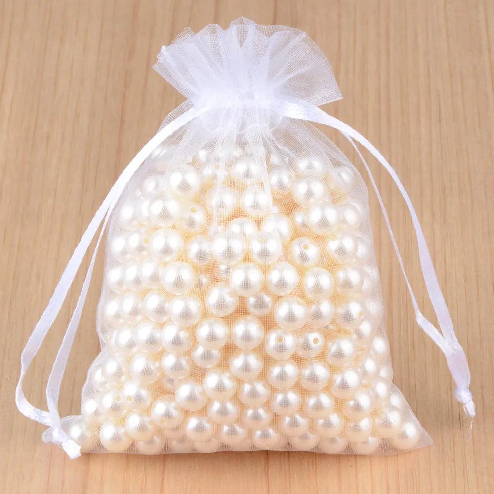 100 peças 24 cores bolsa de embalagem de joias 5*7 7*9 9*12 10*15cm sacos de organza armazenamento de presentes bolsas de cordão de casamento atacado 