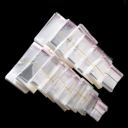 100pcs/lot Transparent Self Adhesive Seal Bags OPP Plastic Cellophane Bags Gifts Bag & Pouch Jewelry Packaging Bags Leedoar