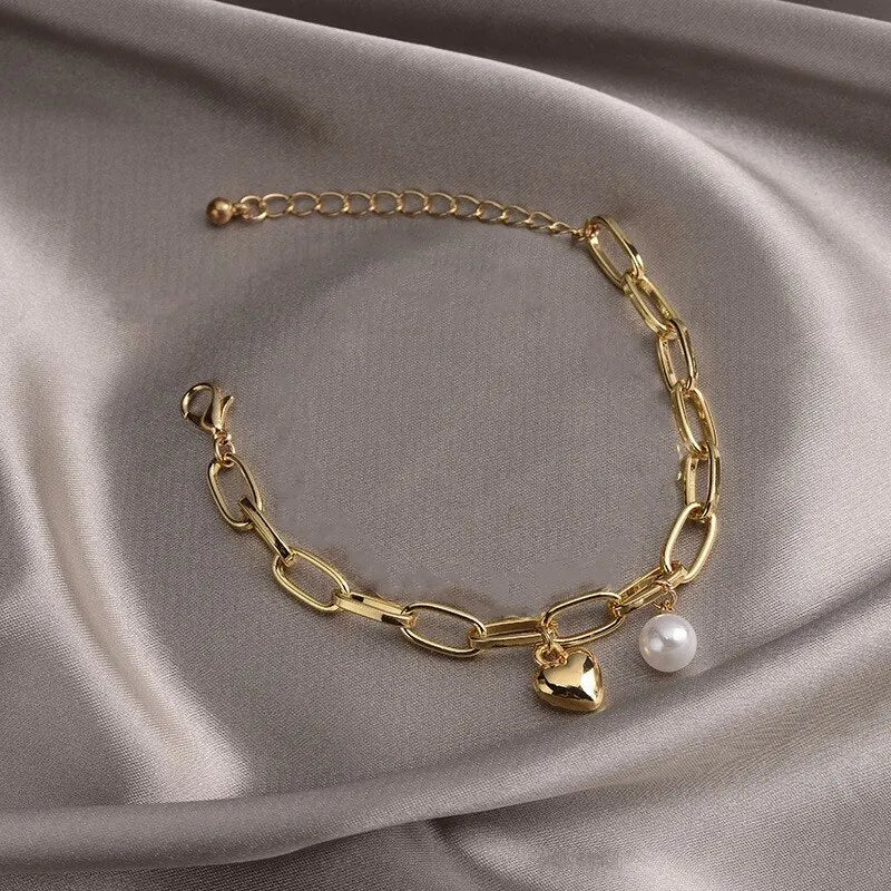 1 pulsera de color dorado para mujer, estilo sencillo, cadena cruzada gruesa con colgante de perla y cruz con cabeza humana de amor 