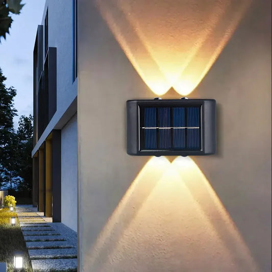 2 piezas de 4 luces LED que se encienden hacia arriba y hacia abajo con energía solar, luz de pared impermeable para patio, jardín, cochera 