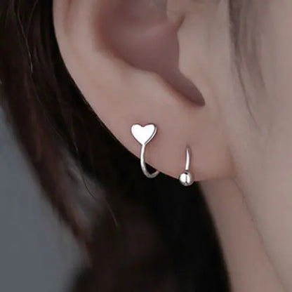 2 peças de aço inoxidável piercing parafuso bola estrela orelha osso rotativo linha onda mini studs mulheres brincos incomuns ajustável 