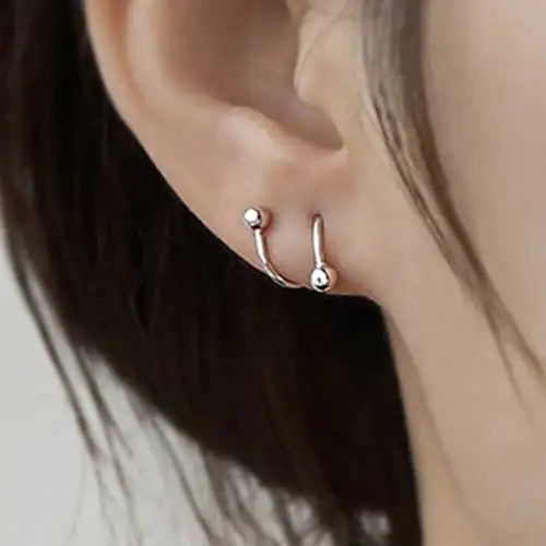 2 peças de aço inoxidável piercing parafuso bola estrela orelha osso rotativo linha onda mini studs mulheres brincos incomuns ajustável 