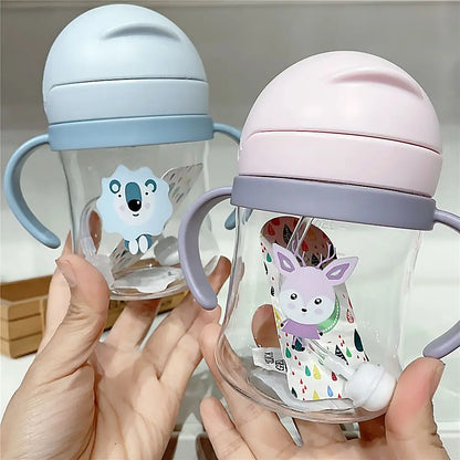 250ML Cartoon Sippy Cups for Toddler Kids Child Learning Cup Water Bottle with Straw and Gravity Ball Handle Feeding Cup Leedoar