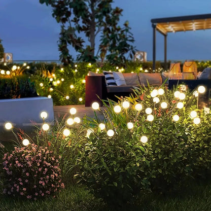 2 piezas de 8 luces LED solares para jardín, luces de luciérnaga para exteriores, luces de jardín vibrantes, impermeables, para decoración de patios y caminos, cálidas 