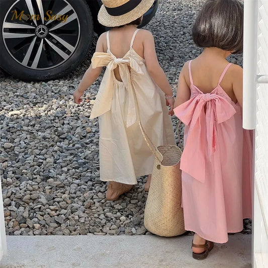 Vestido de tirantes de algodón de princesa para niña pequeña, a la moda, con lazo, para verano, de color liso, 1 a 10 años 