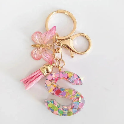 Chaveiro de resina novo e moderno, conta-gotas com glitter rosa, pingente de letra em inglês, acessório de borla de borboleta, chaveiro de férias 