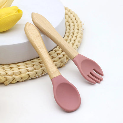 Hot selling food grade silicone wooden handle spoon and fork set for complementary food feeding training spoon and fork Leedoar