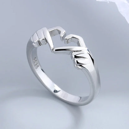 Nuevo anillo romántico con forma de mano y corazón para pareja, creativo, color plateado, ajustable, anillos abiertos, joyería de fiesta con personalidad, regalo 