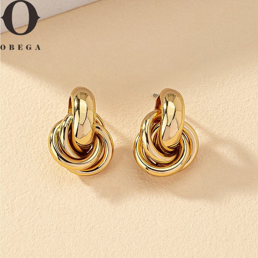 Obega Gold Silver Color Knot Hoop Brinco para mulheres Brilhante Revestimento Trendy Brinco Stud Bonito Joia de Uso Diário