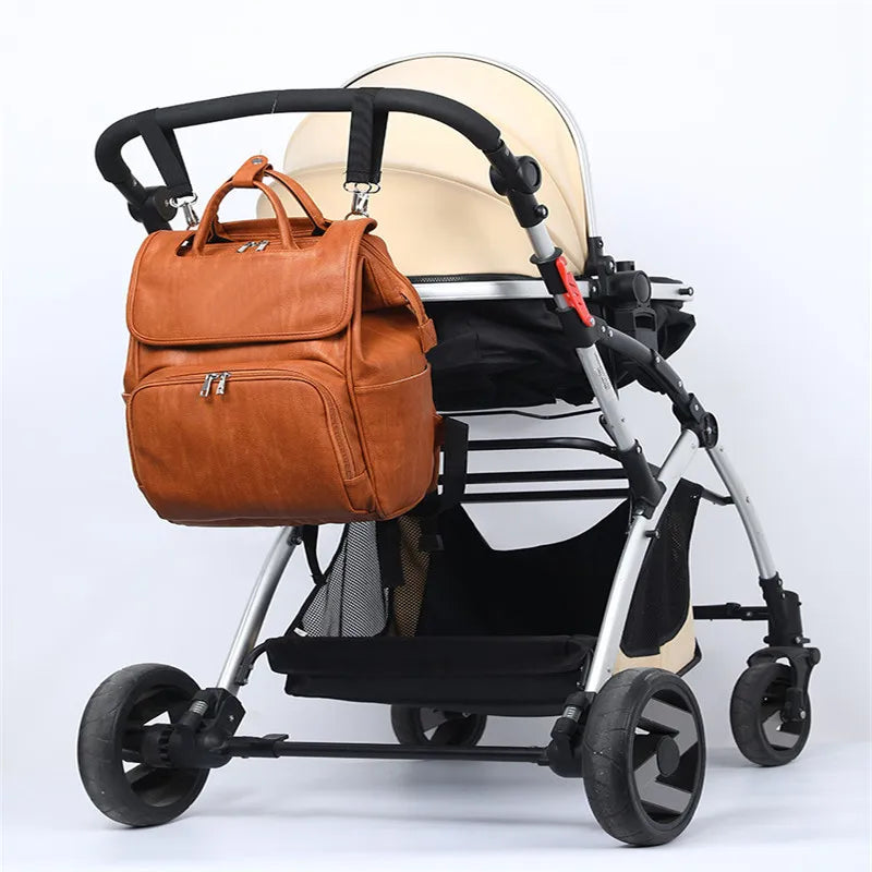 PU Leather baby diaper bag backpack for moms Large Capacity Nappy Bag with Changing pad + Stroller straps Brown and Black