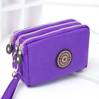 Monedero nuevo 2023 para mujer, cartera pequeña con arandela de tela arrugada, monedero para teléfono, tres cremalleras, bolsa de maquillaje portátil, 17 colores 