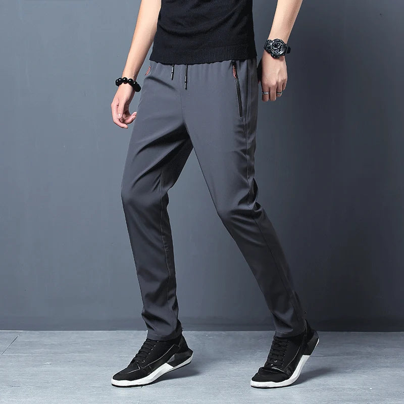 Summer new men's casual pants slim Korean ice silk pants Jin round thin sports pants straight tube quick drying pants Leedoar