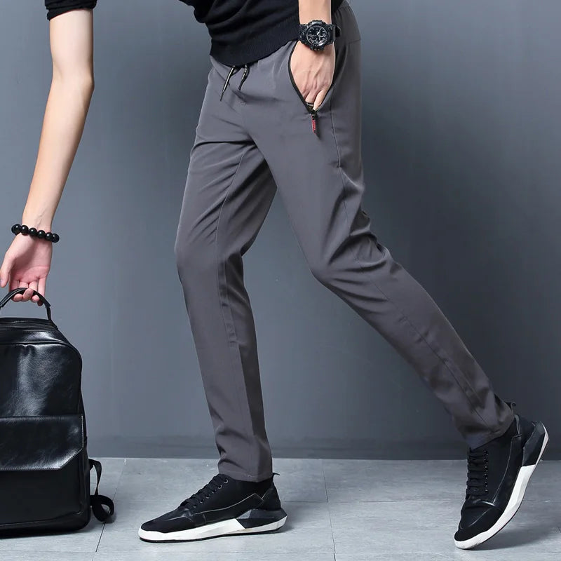 Summer new men's casual pants slim Korean ice silk pants Jin round thin sports pants straight tube quick drying pants Leedoar