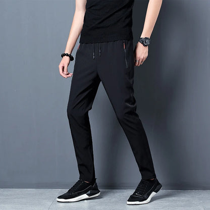 Summer new men's casual pants slim Korean ice silk pants Jin round thin sports pants straight tube quick drying pants Leedoar